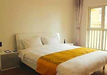 تشينغداو Tujia Vacation Rentals Golden Beach المظهر الخارجي الصورة