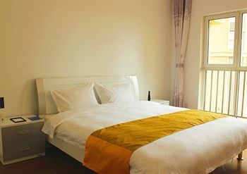 تشينغداو Tujia Vacation Rentals Golden Beach المظهر الخارجي الصورة